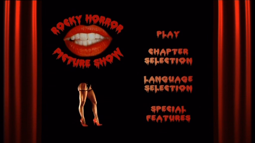 左上方是红唇,下方露出一双腿。右侧有四个菜单项:「Play」「Chapter Selection」「Language Selection」「Special Features」。屏幕两侧是红色幕布。