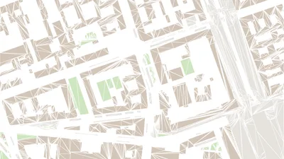 俯视的城市街区图，每栋建筑都被切成细小的三角形，街道留白成网格状，几处建筑用浅绿色标出